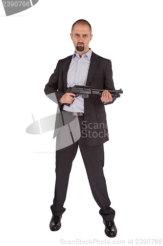 Image of Mafia man is holding a shotgun