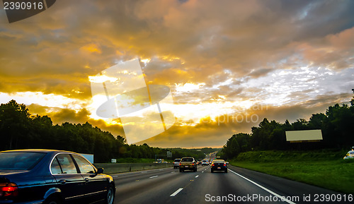 Image of beautiful sunrise over road