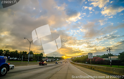 Image of beautiful sunrise over road