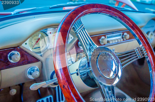 Image of classic car steering wheel dashboard