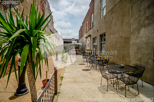 Image of restaurant outside sitting alley