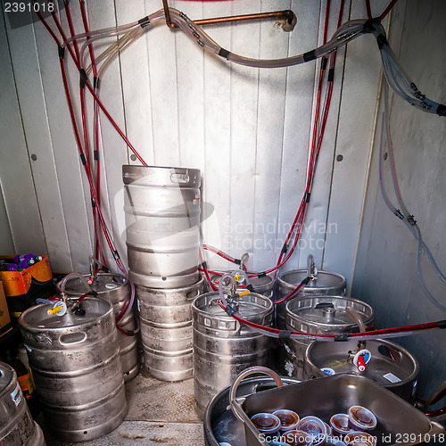 Image of beer kegs in refrigerator