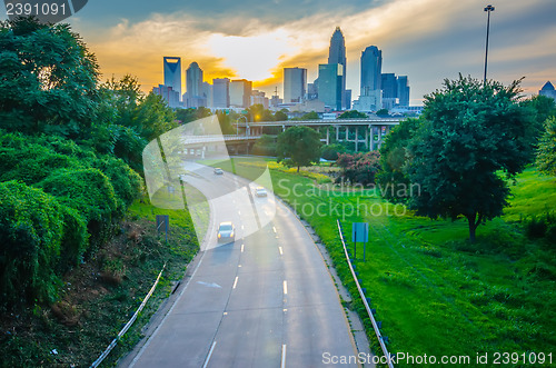 Image of highway traffic near a big city