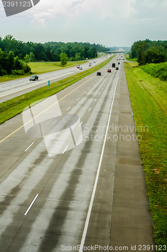 Image of highway traffic near a big city