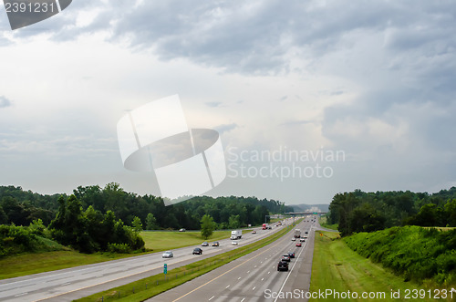 Image of highway traffic near a big city