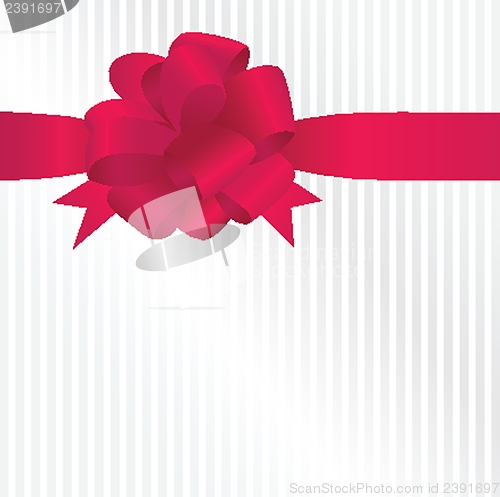 Image of Shiny red satin ribbon on white background