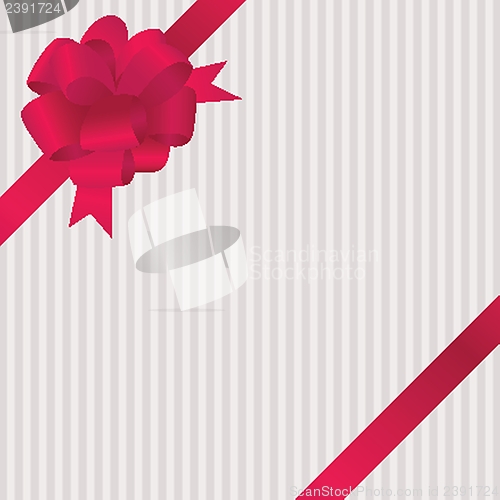 Image of Shiny red satin ribbon on white background