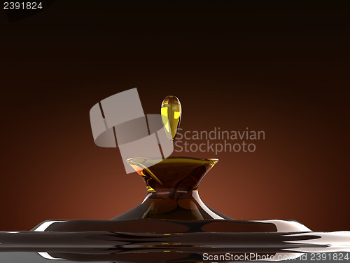 Image of Alcoholic drink splash with droplet: cognac or whiskey