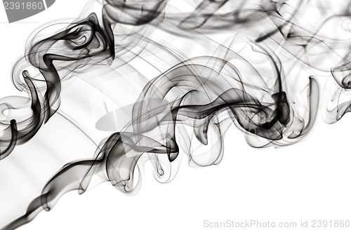 Image of Abstract fume pattern: black smoke swirls and curves 