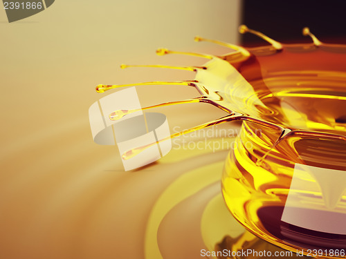 Image of Oil splash and ripples with drops