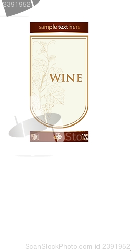 Image of label for a bottle of wine, glasses and a bunch of grapes