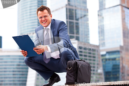 Image of Successful businessman smiling