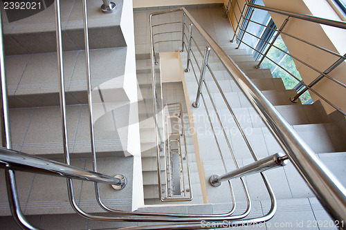 Image of staircase with metal railing