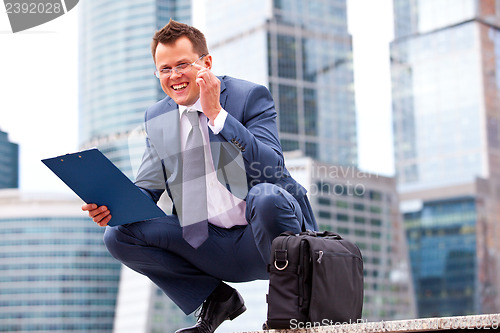 Image of Successful businessman smiling