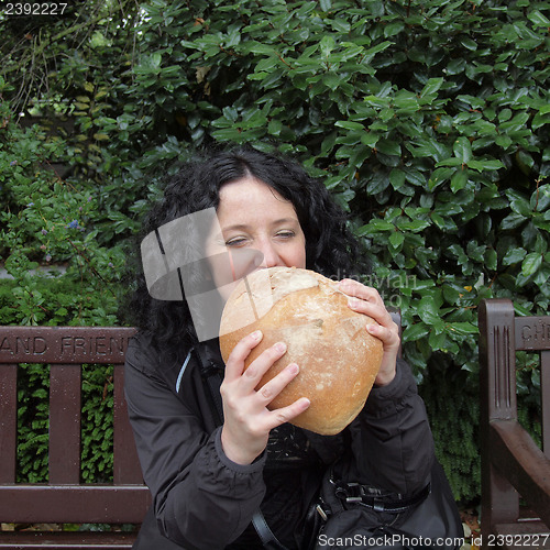 Image of Girl eating bread