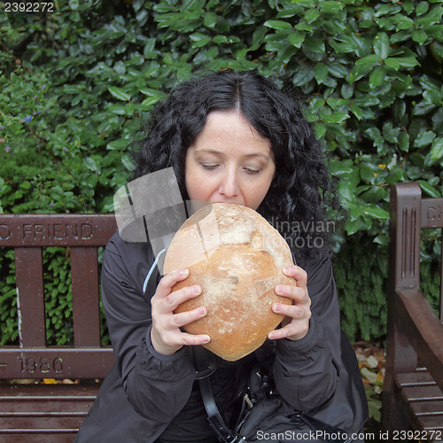 Image of Girl eating bread