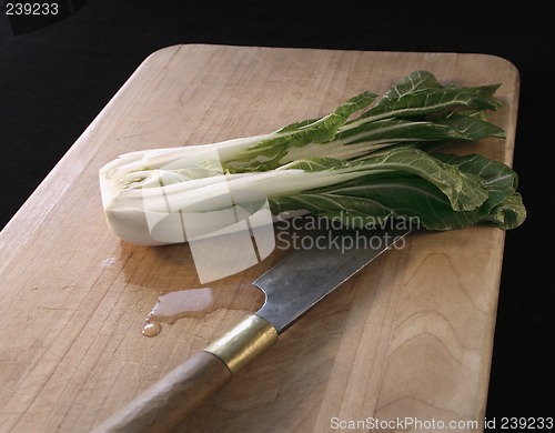 Image of bok choy and knife on a cutting board