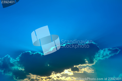 Image of Clouds and sunrays background