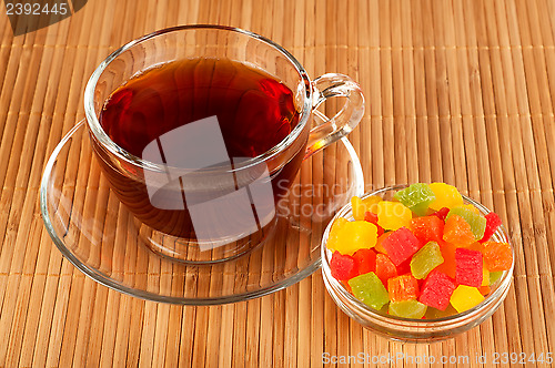 Image of Cup of tea with candied fruits