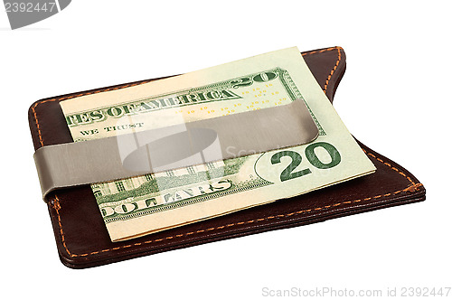 Image of Dollars in money clip.