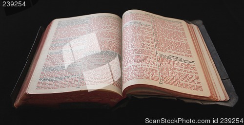 Image of old Bible with red text