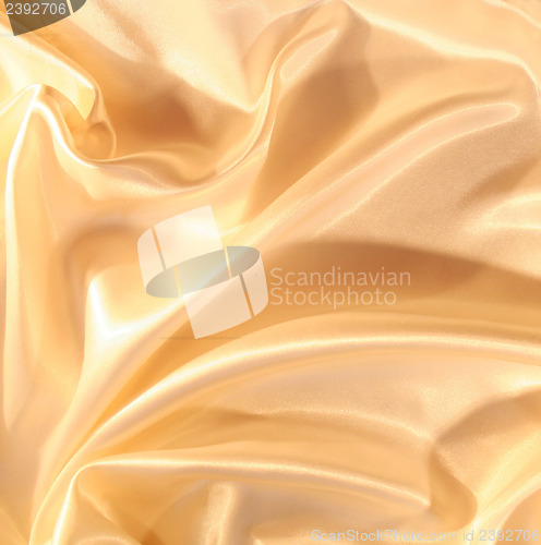 Image of Smooth elegant golden satin as background