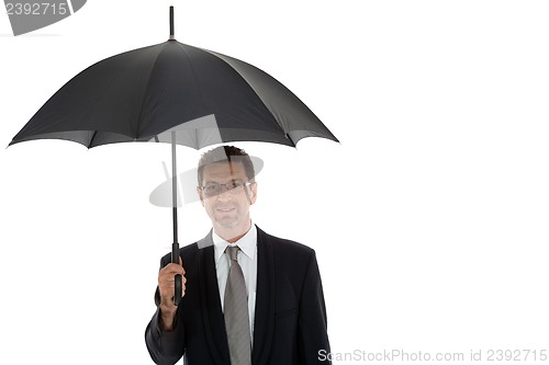 Image of mature attractive business man with umbrella isolated