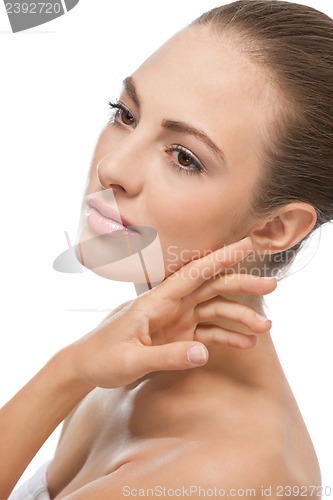 Image of beautiful young woman with perfect skin and soft makeup 