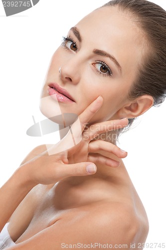 Image of beautiful young woman with perfect skin and soft makeup 