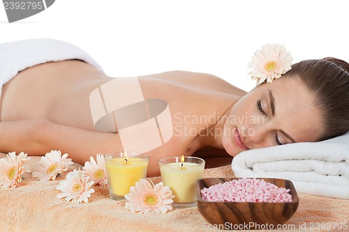 Image of young attractive smilig woman doing wellness spa
