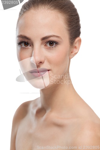 Image of beautiful young woman with perfect skin and soft makeup 