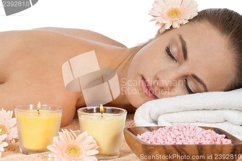 Image of attractive helathy caucasian woman hot stone massage wellness 