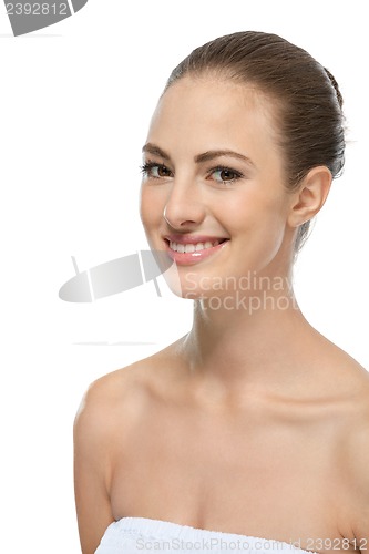 Image of beautiful young woman with perfect skin and soft makeup 