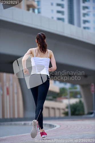 Image of woman jogging at morning
