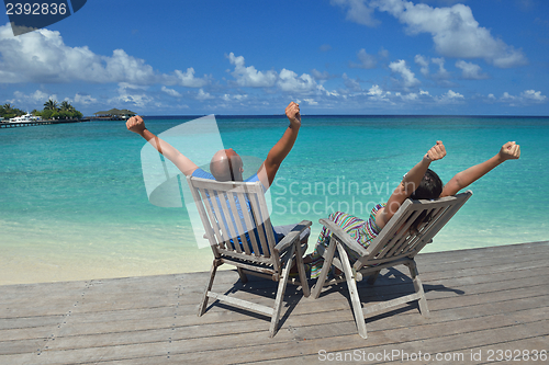 Image of happy young couple have fun on summer