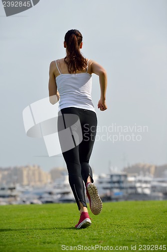 Image of woman jogging at morning