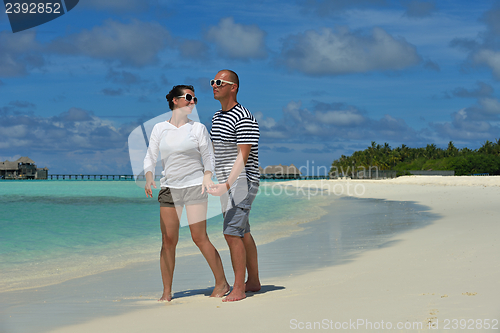 Image of happy young couple have fun on summer