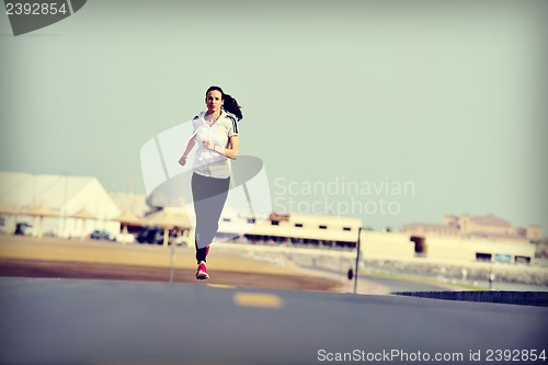 Image of woman jogging at morning