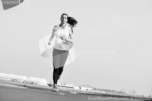 Image of woman jogging at morning