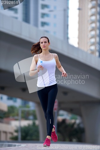 Image of woman jogging at morning