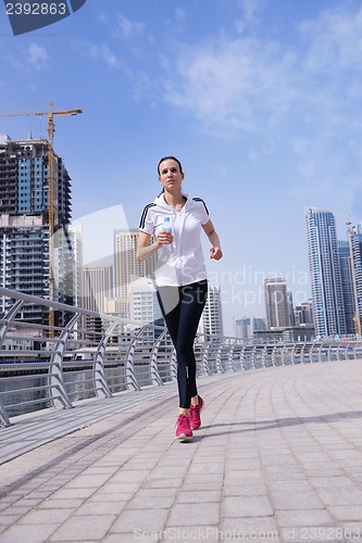 Image of woman jogging at morning