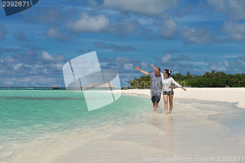 Image of happy young couple have fun on summer