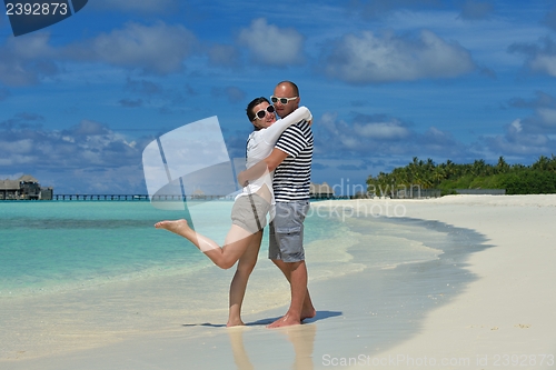 Image of happy young couple have fun on summer