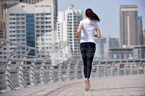 Image of woman jogging at morning