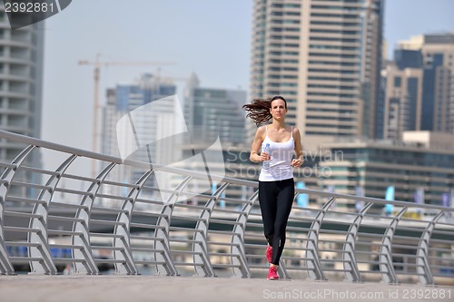 Image of woman jogging at morning