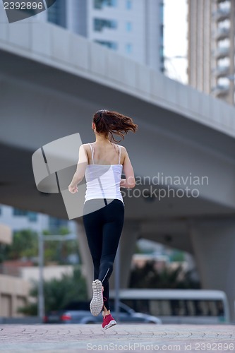 Image of woman jogging at morning