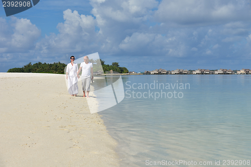 Image of happy young couple have fun on summer