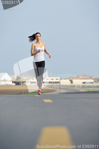 Image of woman jogging at morning