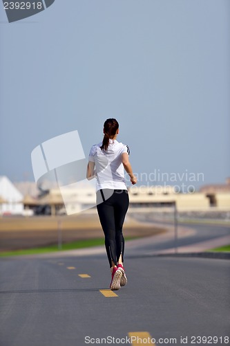 Image of woman jogging at morning