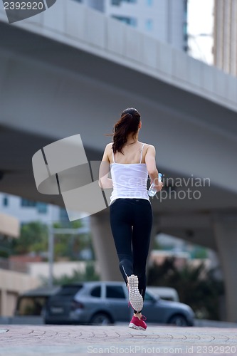 Image of woman jogging at morning